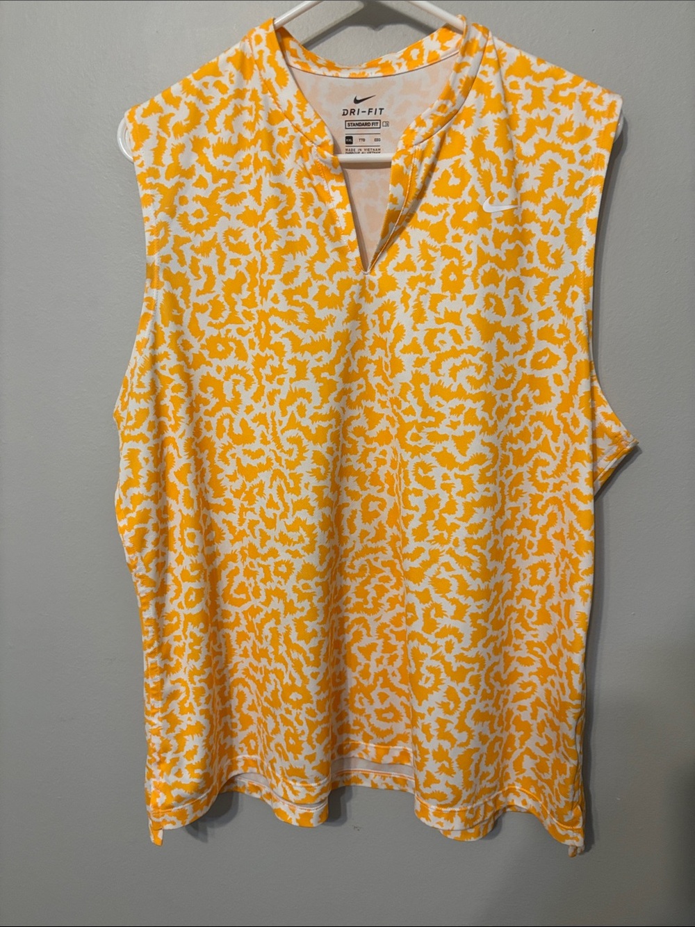 Nike Sleeveless Dri-FIT Polo in Yellow & White Abstract